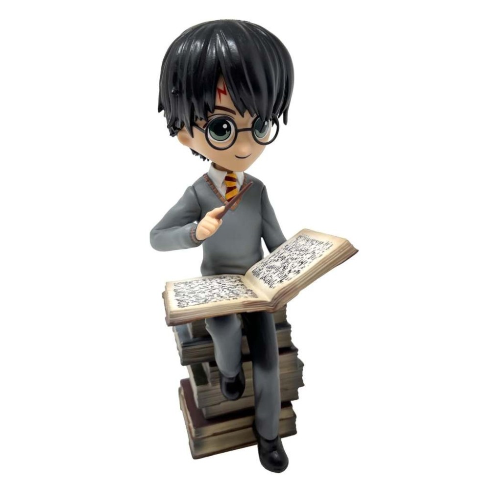 PLASTOY HARRY POTTER ON PILE OF SPELL FIGURE STATUE